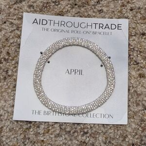NWT Aid Through Trade Roll On Bracelet April